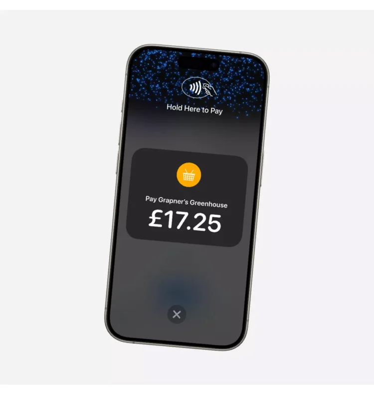 An image of a phone using contactless pay.