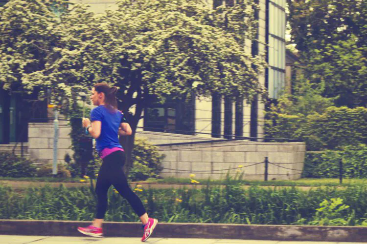 A woman jogging.