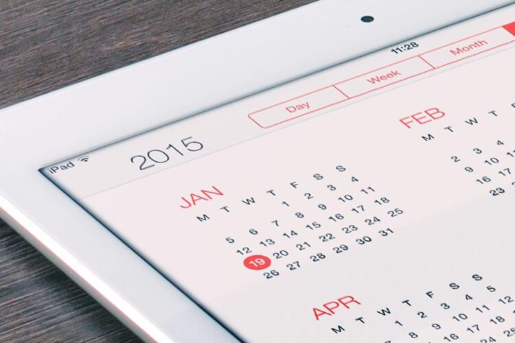 A close up image of a iPad displaying the calendar app.